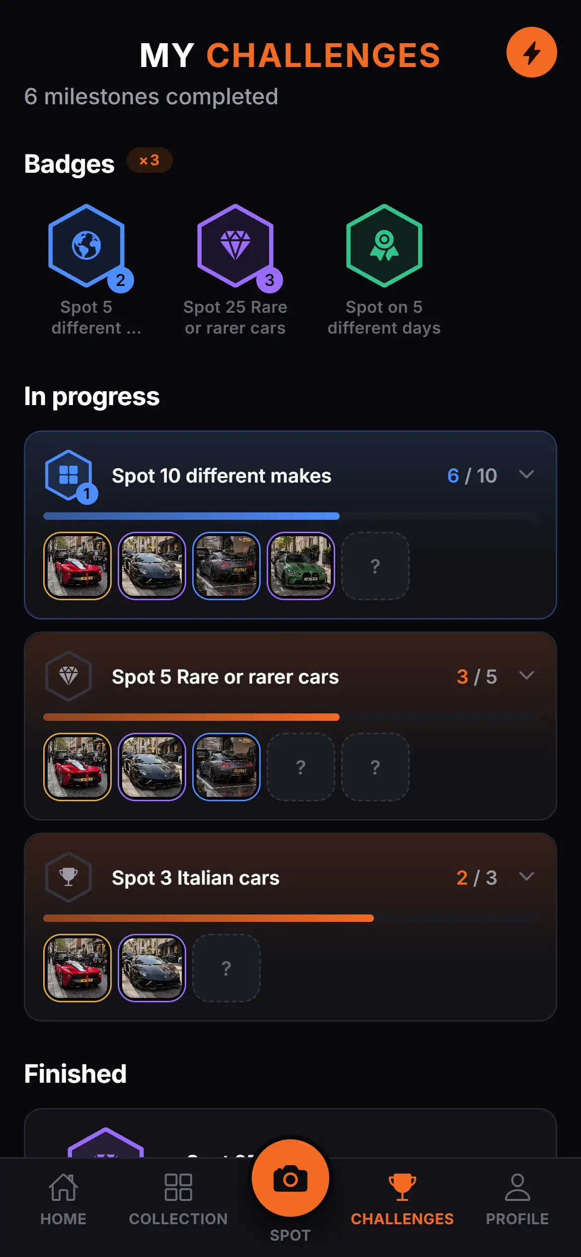 The Challenges screen, showing badges earned and challenges in progress.